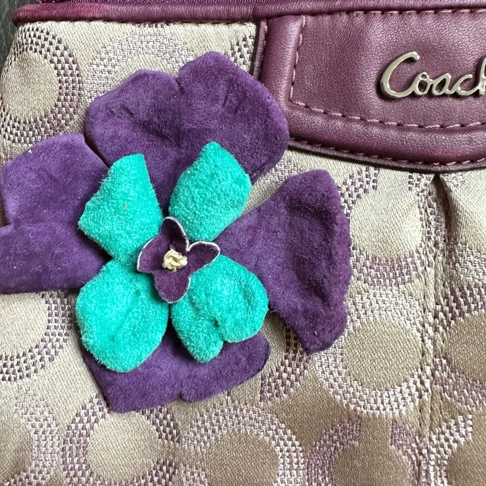 Coach Wristlet with suede flowers. Upstyled for a fresh new look. 9.25x5.5 x1”